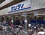 周辺：【スーパー】サンディ 十三店まで554ｍ